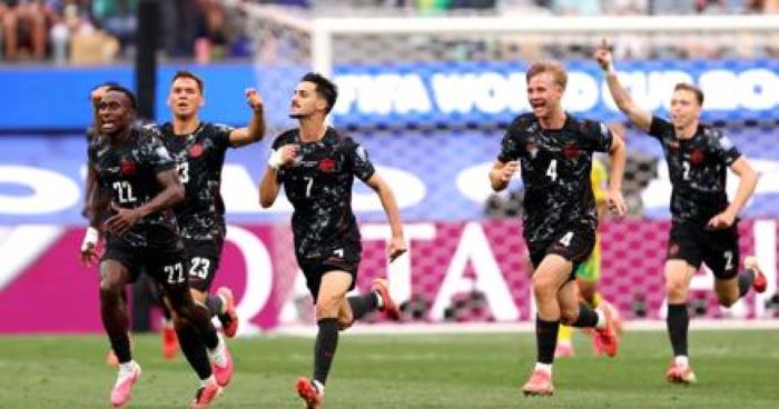Canada reach first World Cup last 16 with late win over South Africa